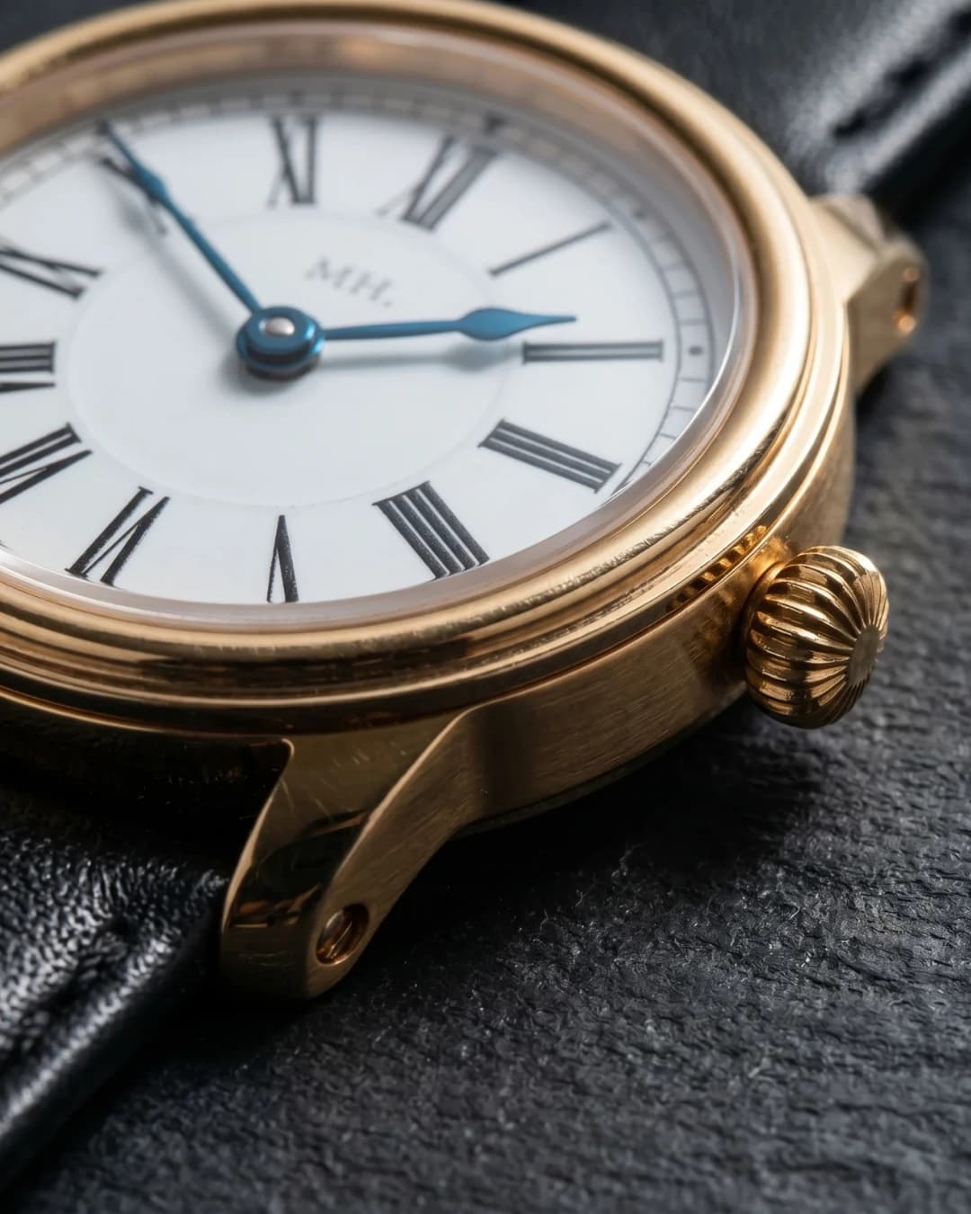 Gold-tone Roman numeral watch on leather strap — AI watch photography for ecommerce listings