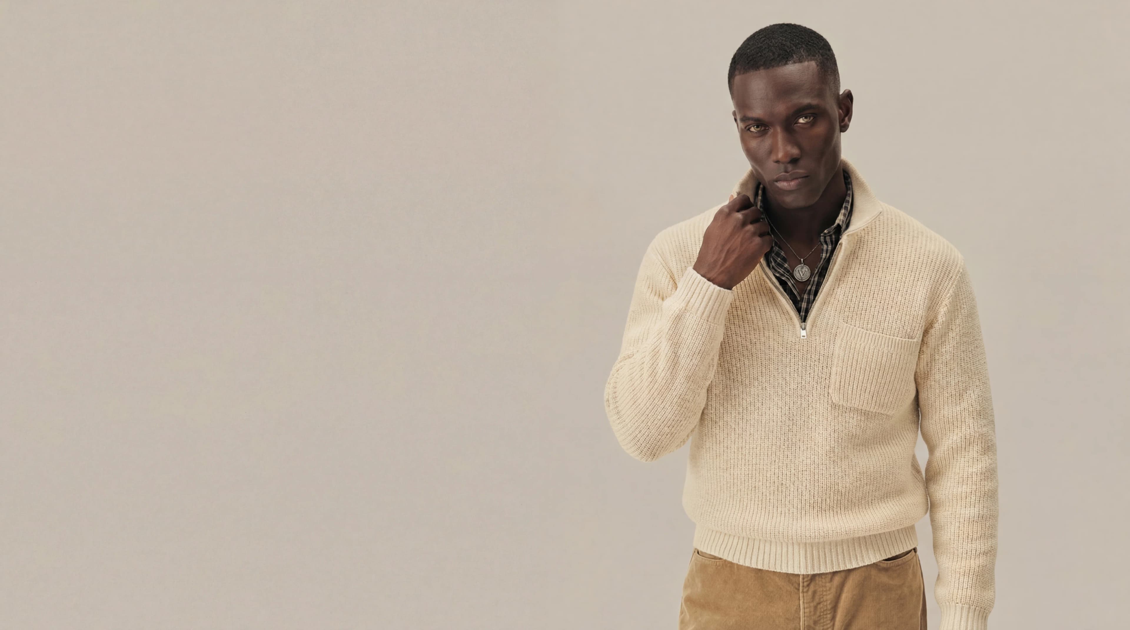 Man in cream half-zip knit sweater — AI menswear product photography for ecommerce and lookbooks