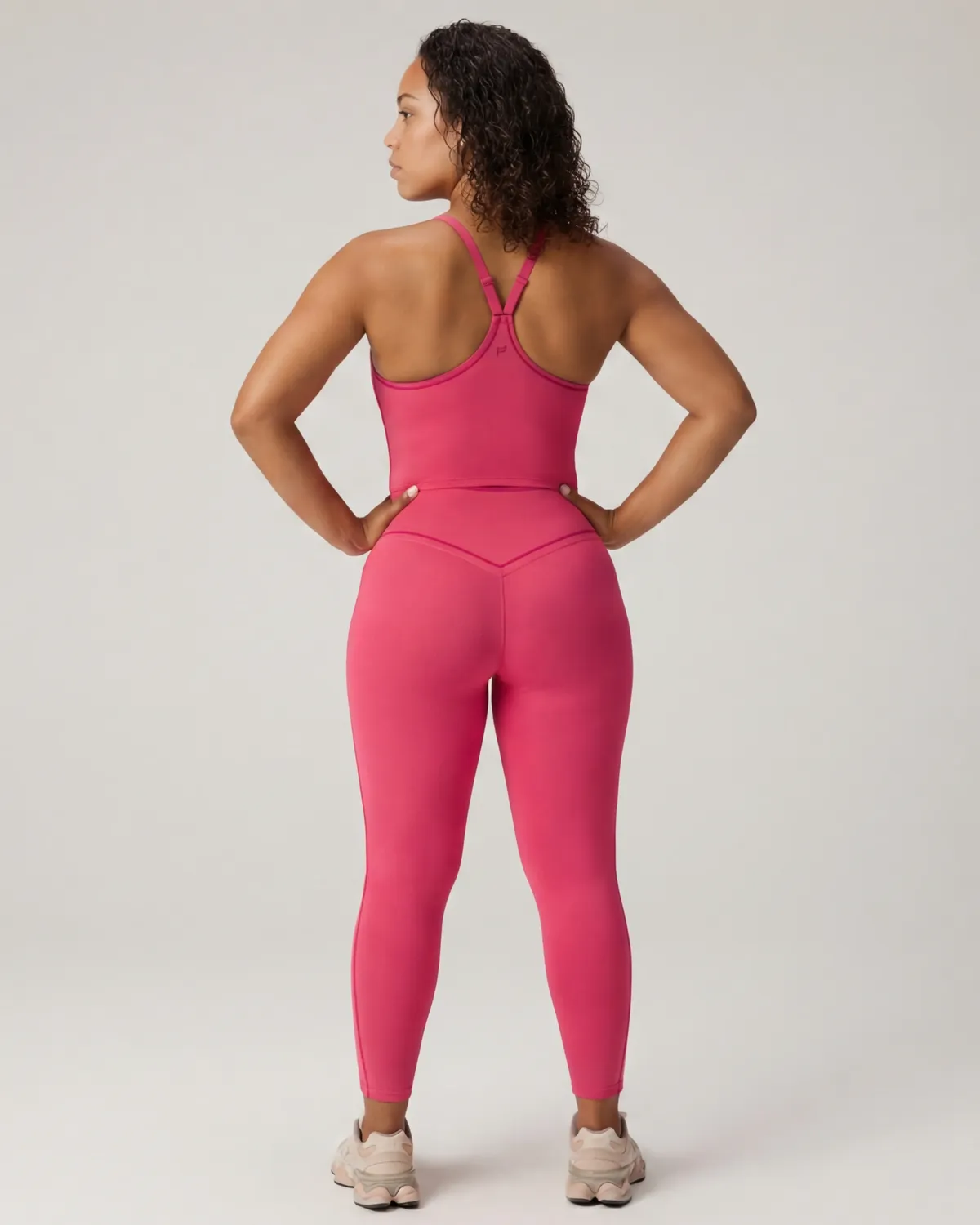 Black leather and cord bracelets on white display — AI accessories product photography for ecommerce